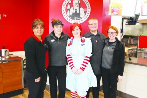 Wendy’s Manager Debbie Nichols, Myrtle Strange, Rachel Madden (as Wendy), J.D. Staggs, and Jessica Rothwell welcomed guests at Wendy’s Customer Appreciation Day.  Photo by Patricia Beech - People's Defender