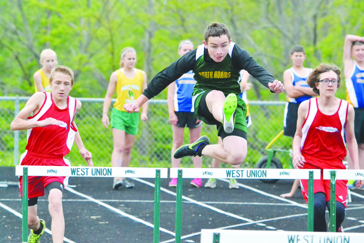 North Adams eighth grader Brandon Figgins easily clears this hurdle on his way to winning the 110 Meter Hurdles at this wek’s Junior High County Meet.  Figgins won the event in a time of 18.95.  Photo by Mark Carpenter