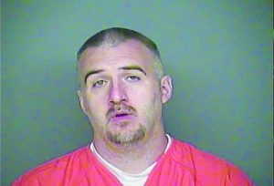John Kenneth Fronk II, suspected of a string of robberies in the area, died after hanging himself with a sheet at the Adams County Jail.