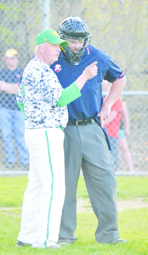 West Union head baseball coach Joe Kramer, left, will lead his troops into postseason play on May 11 with a trip to Adena to battle the number two-seeded Warriors.  Photo by Mark Carpenter