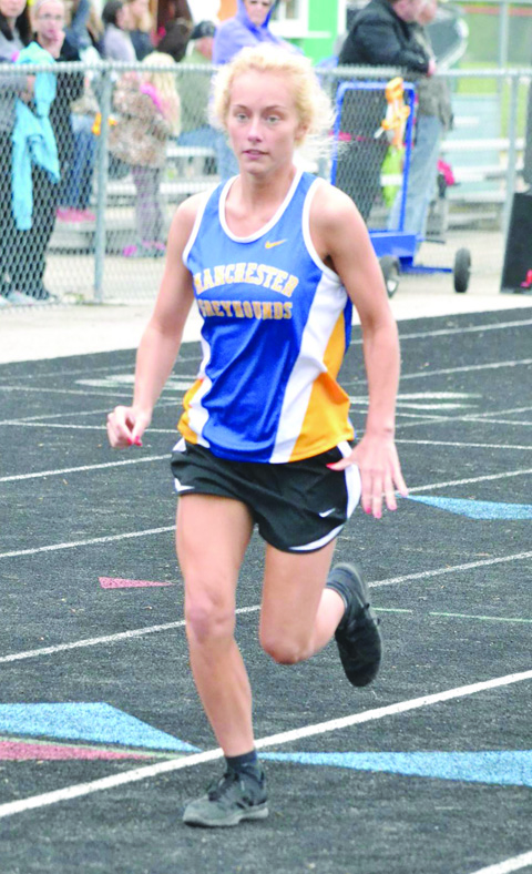 Manchester junior Shyanne Tucker claimed the SHAC championship in the Girls 3200 Meter Run, eight long trips around the track.  Photo by Mark Carpenter.
