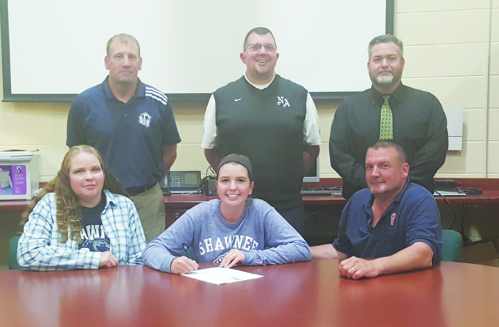 Pictured at the April 27 signing ceremony are: Front row, from left, Julie Spriggs (mother), Jade Spriggs, Charlie Spriggs (father); Back row, from left, SSU Golf Coach Dave Hopkins, North Adams Athletic Director Tony Williams, and North Adams HS Principal Matt Young.  Photo by Mark Carpenter