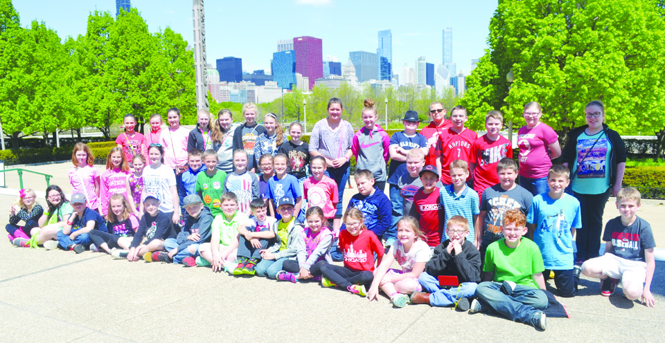 The students in the TAG program in the Adams County Ohio Valley Local School District recently made an end-of-the-year field trip to the city of Chicago.  Here, the students are shown in front of the city’s skyline.