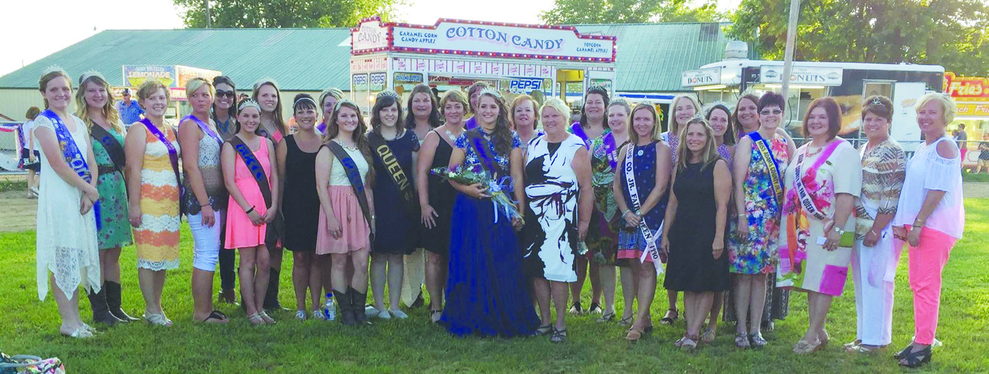 One of the highlights of the opening night of the 2016 Adams County Fair was the appearance of many of the Junior Fair Queens from the past 50 years. The past queens appeared in the opening parade and then were part of the audience at the 2016 Queen Pageant. Here, they are pictured with 2016 Queen Caitlin Young, center, who was crowned in ceremonies on Sunday evening at the fairgrounds.