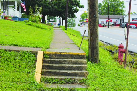 This section of sidewalk on south Main Street in Peebles is scheduled for repairs this week.