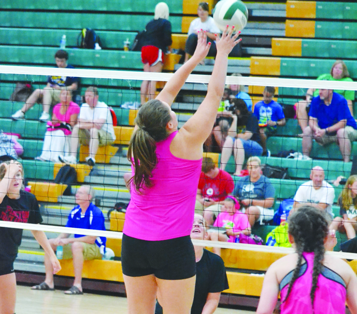 North Adams’ Avery Harper battles at the net in action from last week’s pre-season volleyball tournament in Seaman.