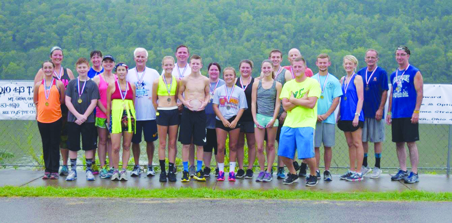Though a rainy Saturday morning may have kept some runners away, over 30 braved the wet conditions to be a part of the 2016 River Days 5K race.  Pictured above are the winners in all the various age groups with Ethan Pennywitt being the top overall male runner and Ashley Hackworth the top overall female runner.  Photo by Michelle Bilyeu.