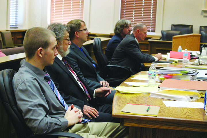 Defendant Denny Blanton,Jr., foreground, listens to testimony during his trial on rape and kidnapping charges this week at the Adams County Courthouse.  Also pictured, from left, are defense attorneys Mike Kelly and Tyler Cantrell, Adams County Prosecutor David Kelley, and Adams County Assistant Prosecutor Kris Blanton.