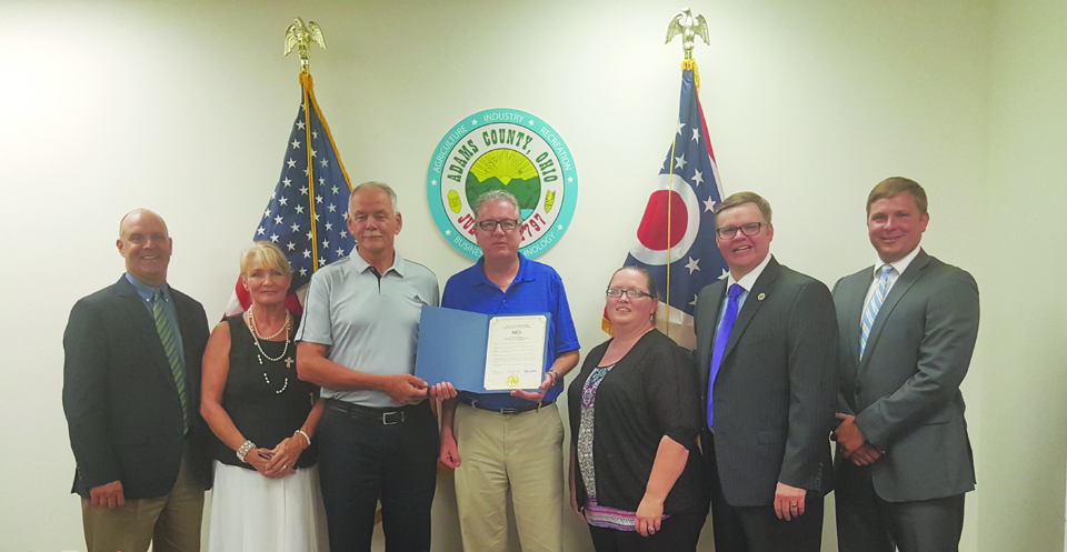 On Monday, Aug. 8, The People’s Defender was recognized with a proclamation by the Adams County Commissioners, honoring the newspaper for its 150 years of service to the citizens and communities of Adams County. Pictured here at the presentation are from left, Commissioner Brian Baldridge, Patricia Beech (Reporter), Terry Rigdon (Advertising), Mark Carpenter (Editor), Peggy Niswander (Advertising), Commissioner Stephen Caraway, and Commissioner Paul Worley.