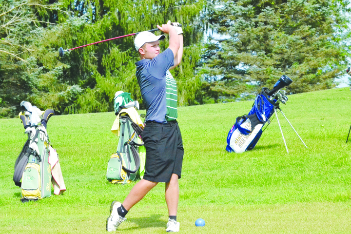 North Adams’ Patrick England follows his shot from the fairway during action from last week’s Adams County Cup.  England shot a 77 for the 18-hole tourney to earn All-County honors.