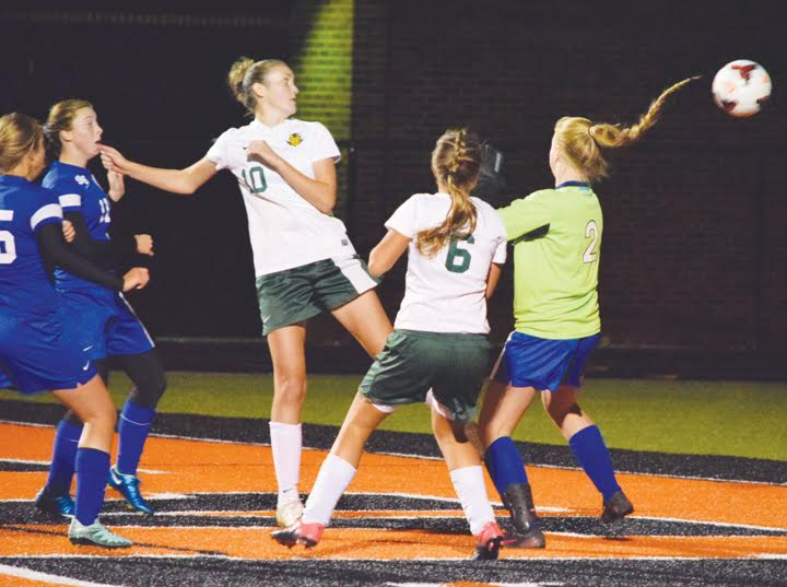 North Adams senior Abby Shupert (10) got just enough of this ball to get it past the Southeastern goalkeeper with 28:51 left in the game, for what turned out to be the game-winning score for the Lady Devils.