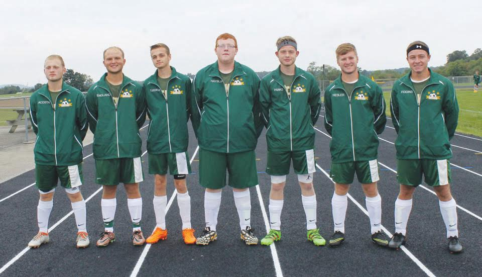 With their 1-0 loss to Bishop Rosecrans in the district tournament, the high school soccer careers came to a close for these seven North Adams seniors.  From left, Zeke Acosta, Patrick England, Kain Turner, Randall Hayslip, Austin Parks, Lee Hesler, and Ben Figgins.