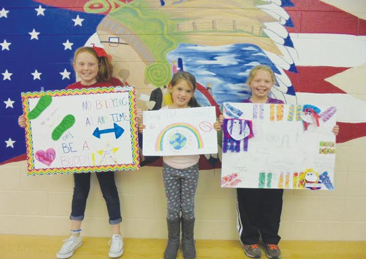 Winners of the Bullying Prevention Month Poster Contest , from left,  Abigail Smalley-First Place (Fourth Grade), Makenna Bennington - Second Place (First Grade), and Ma Rhea Unger - Third Place (Fourth Grade).