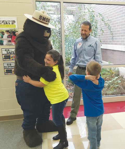 Students at Peebles Elementary recently got the opportunity to meet their favorite fire-preventing bear as part of the “Trees To Textbooks” program.