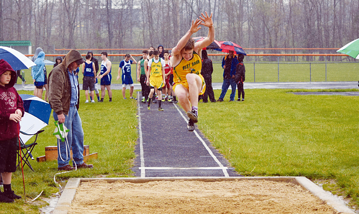 Despite soggy night, WUHS hosts annual Invitational Meet | People's ...