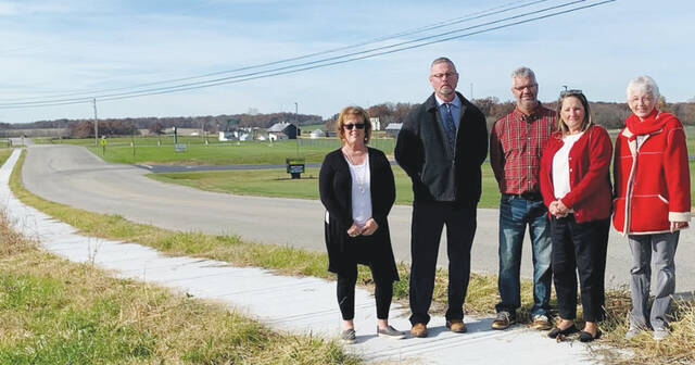 Pictured above are Debbie Ryan, Adams County Health and Wellness Center Coordinator, Karl Burger, NAHS Director, Seaman Mayor David Hughes, Adams County Director of Economic Development Holly Johnson and Beverly Mathias, member of the Adams County Health and Wellness Alliance, at the new Pier Extension on Morris Road which now continues all the way to Medical Center Drive, safely linking the village center with North Adams Schools and Fitness Trail.  This berth expansion is part of a larger project that eventually aims to have an ADA-certified berth accessible from the entire medical center complex around Medical Center Drive, Commerce Drive and Moores Road.