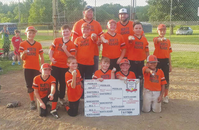 North Adams was the winner of the SHYL 10U Baseball tournament played in Ripley. The champions are pictured above. proudley displaying their championship rings. Front row, from left, Zane Rothwell, Corey Brown, Gage Sowards, Bryson Moore and CJ Boner; Middle row, from left, Pierce Harper,Keith Sowards, Drew McCann, Bentley Parker, Jax Kingsley and Bryce Phelps; Back row, Coaches Chris Parker and Danny Hodge. (Photo provided)